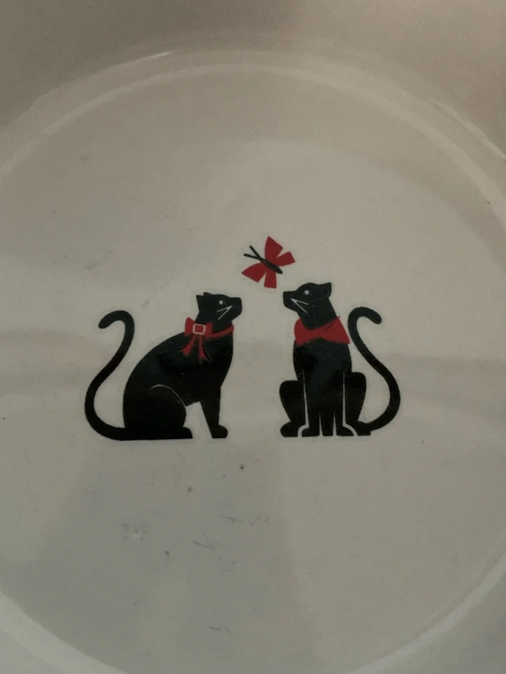 Pet bowl with whimsical city cats design